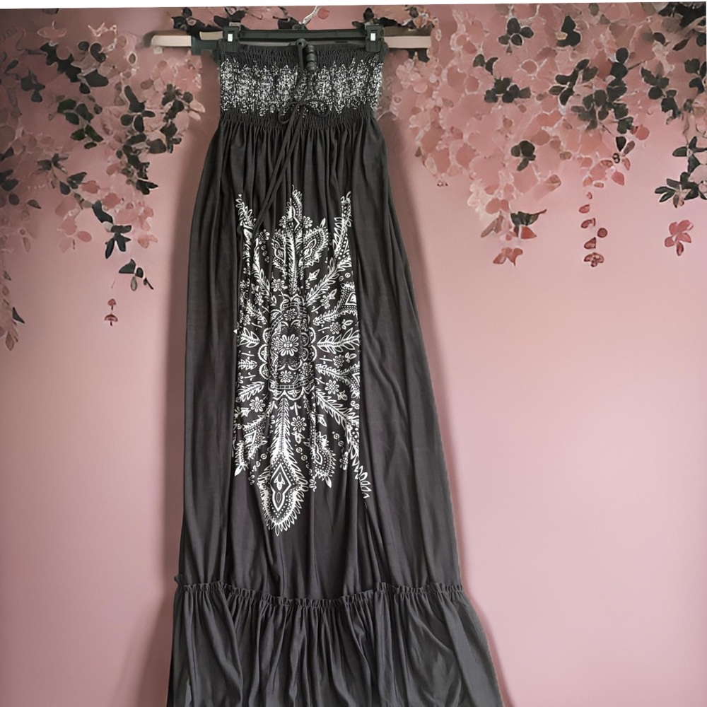 Cristina Love, long dress strap ties around the neck.